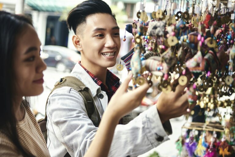 Tourists buying decorations at the Vietnamese market